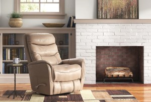 Leather recliner by a fireplace